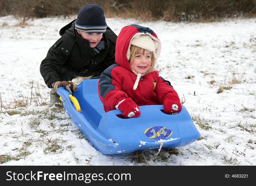 Brother and Sister sledging