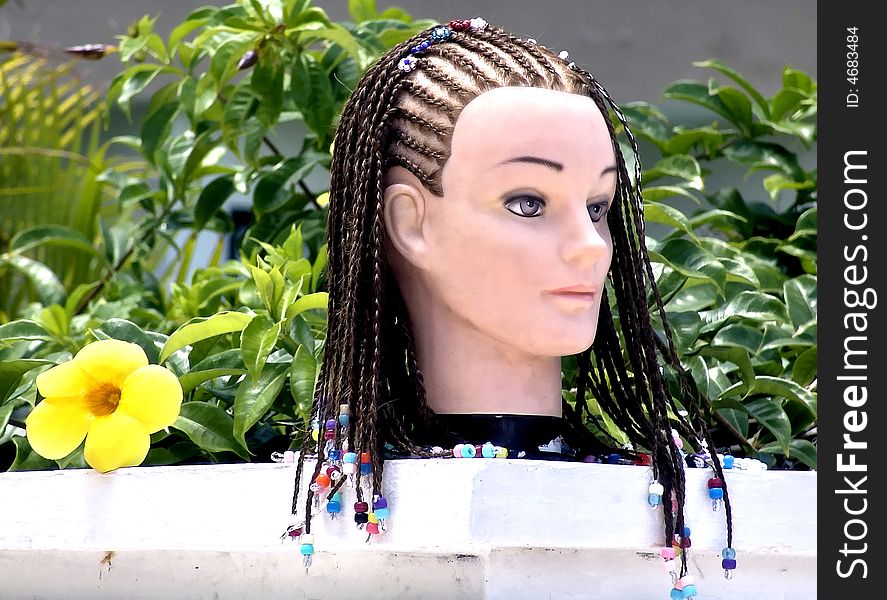 Dummy head with vacation hairstyle. Cancun, Mexico