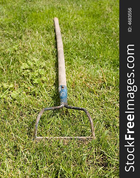 Pickaxe lying on the grass