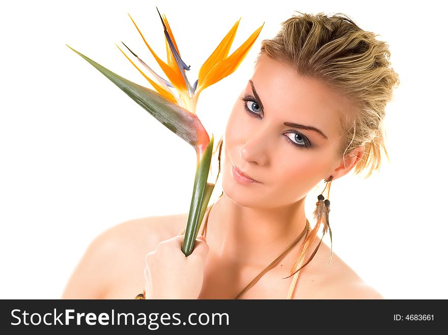 Beautiful woman with bird of paradise floser isolated on white background