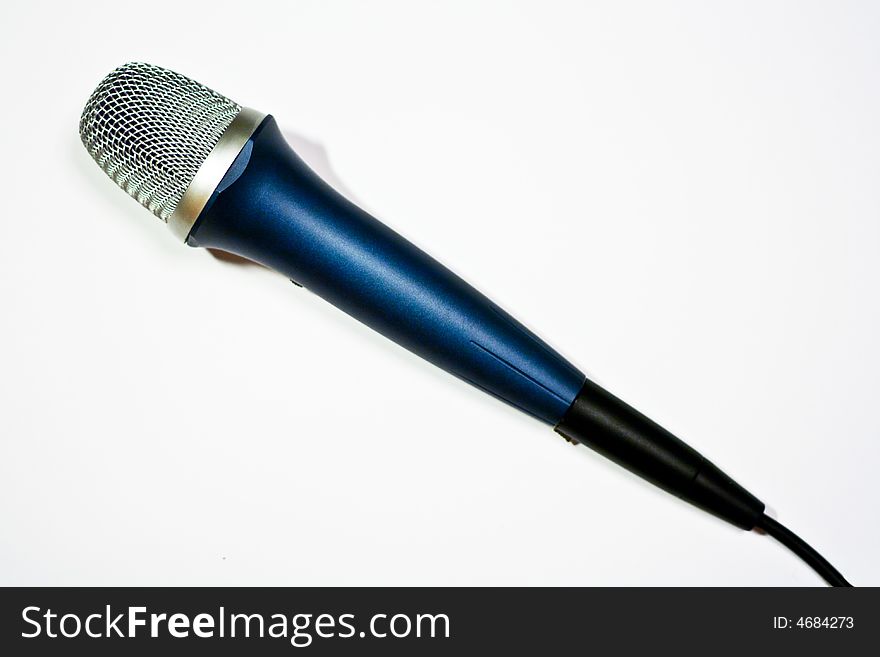 Blue mic over the white background. Blue mic over the white background