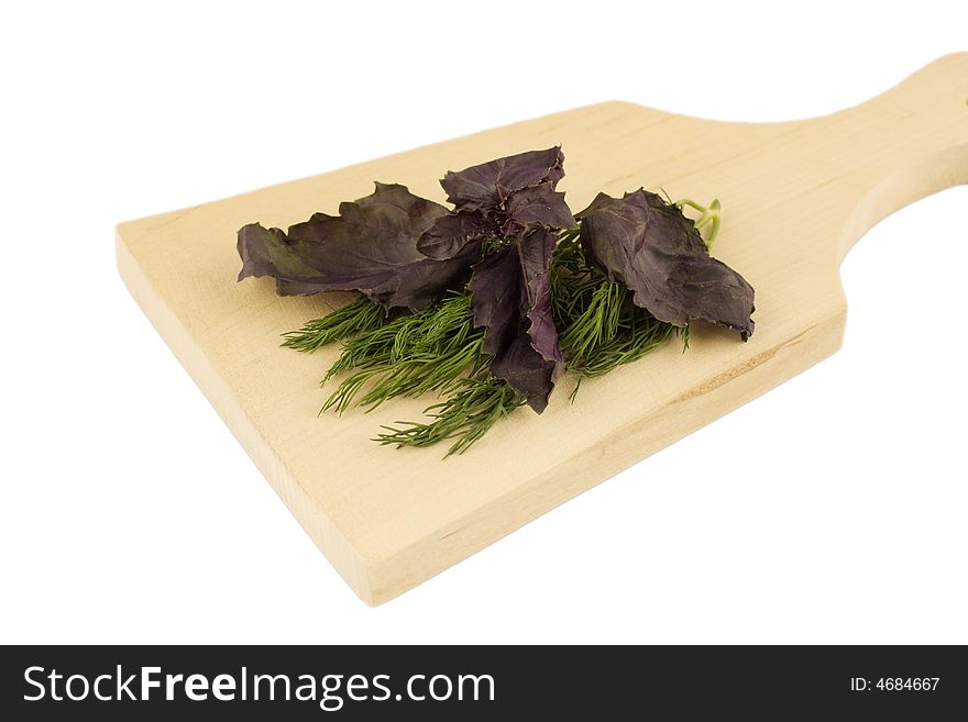 Isolated cutting board with fresh potherbs. Isolated cutting board with fresh potherbs