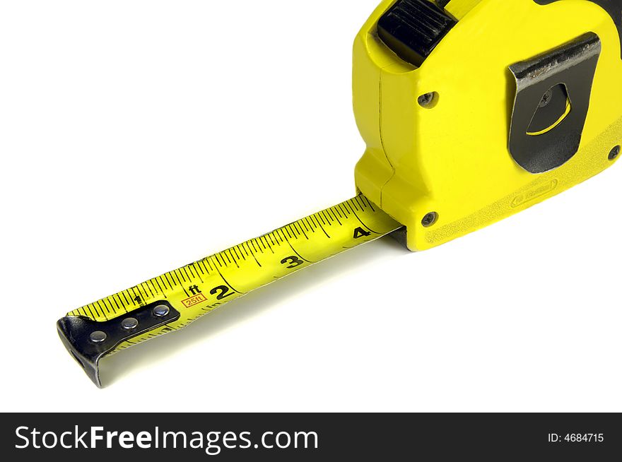 Yellow tape measure on a white background. Yellow tape measure on a white background.