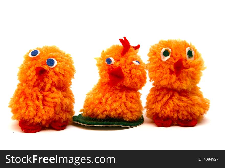 Tree chicken figures made of wool by children. Tree chicken figures made of wool by children