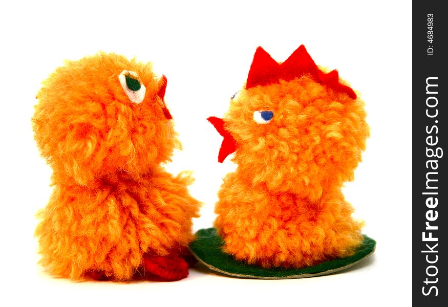 Two chicken figures made by children as easter decoration. Two chicken figures made by children as easter decoration