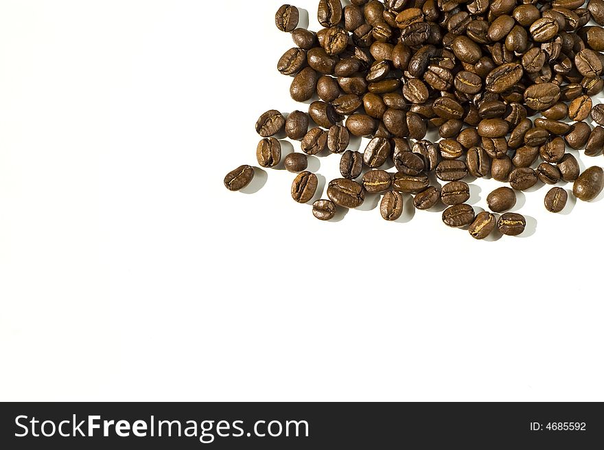 Coffee beans against white background. Coffee beans against white background