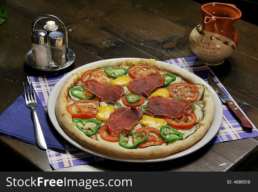 Very delicious italian pizza served on a wooden table