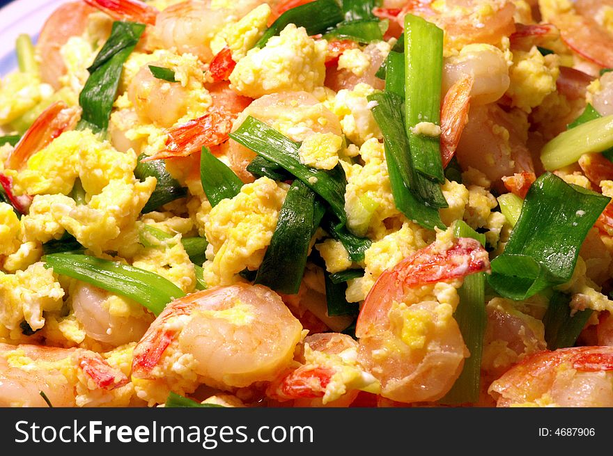 Chinese dish made with shrimp, egg and green onion