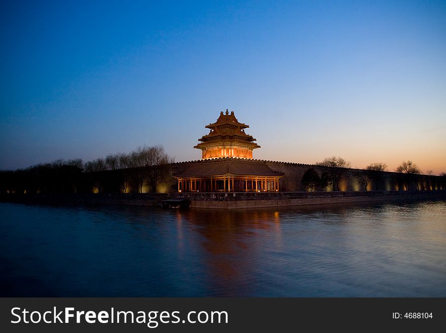 The watch tower of the forbidden city at sunset