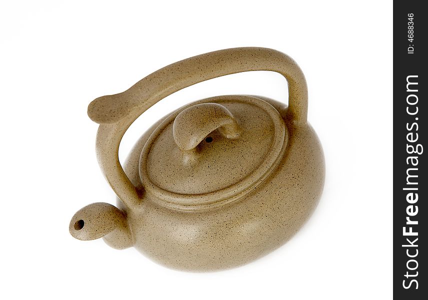 Clay teapot,also called zisha teapot in China,also it is a artwork. isolated on white background.