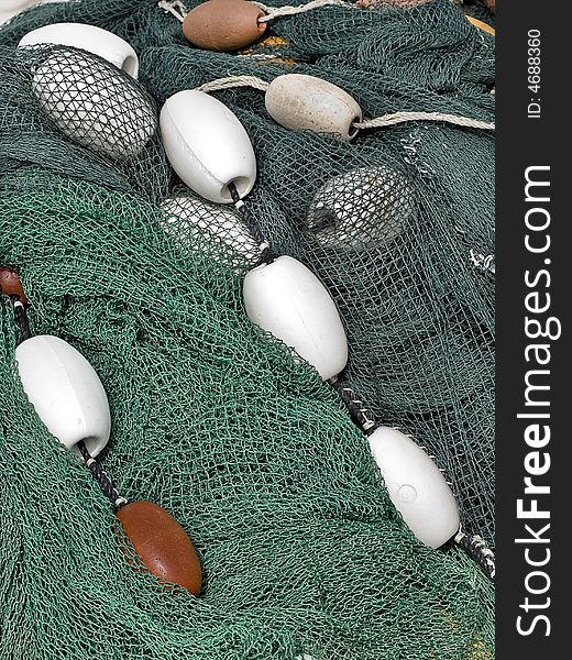 Green & gray fishing net fishing float