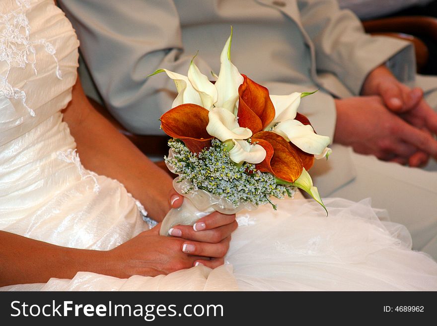 Beautiful bridal bouquet in the hand of the bride.