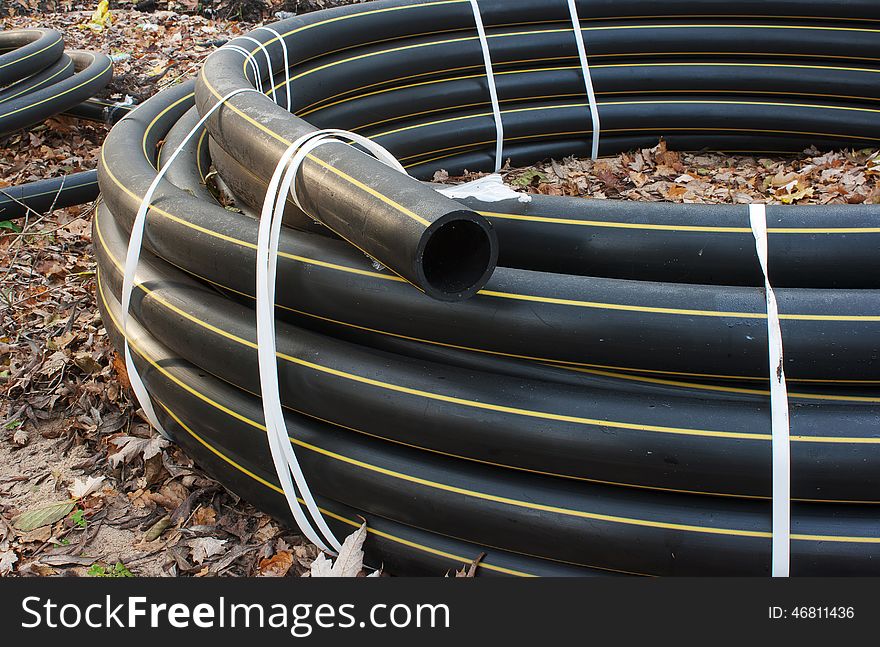 Black plastic sewer pipe outside closeup