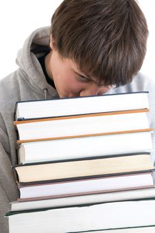 The Young Student With A Pile Of Books Isolated Stock Images The Young Student With A Pile Of Books Isolated Stock Images