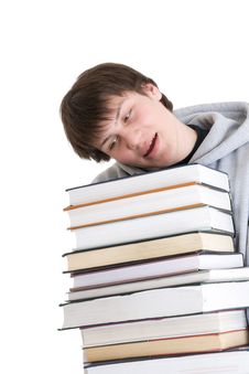 The Young Student With A Pile Of Books Isolated Royalty Free Stock Image The Young Student With A Pile Of Books Isolated Royalty Free Stock Image