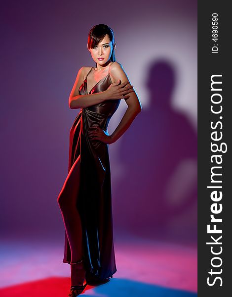 Asian woman in evening wear with seductive eyes