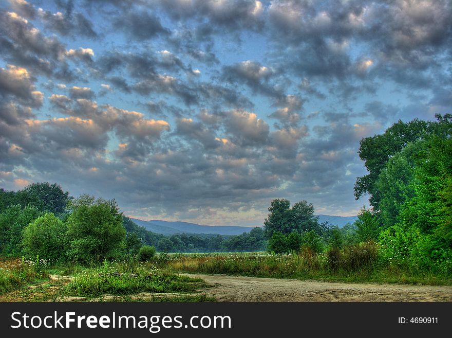 Landscape with mountains under morning sky with clouds. Landscape with mountains under morning sky with clouds