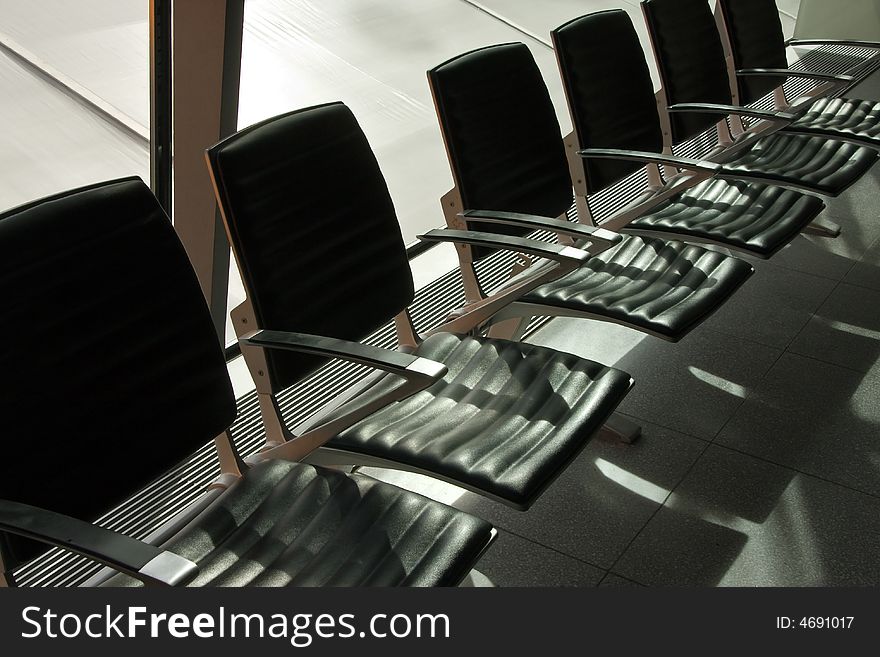 Chairs in the departure lounge at the airport