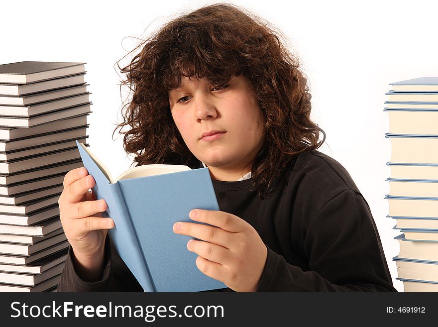 Boy reading a book and many books on white background