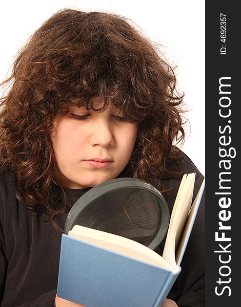 Boy reading a book with lens on white background