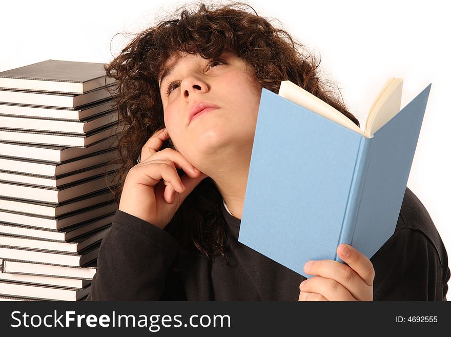 Boy thinking and reading a book on white background