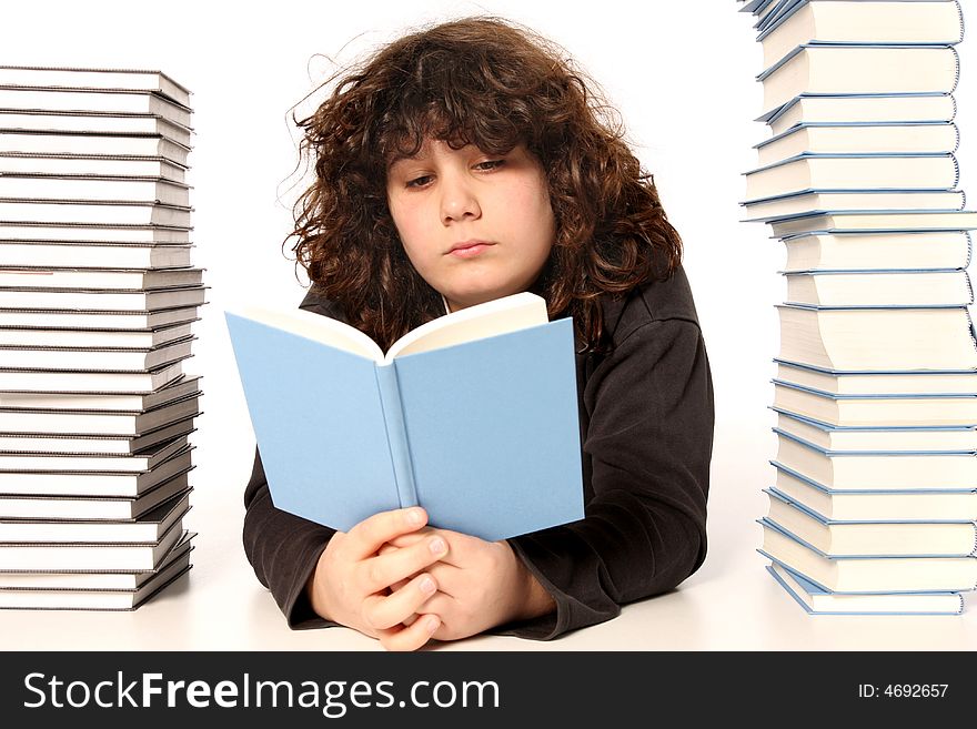 Boy reading a book and many books on white background