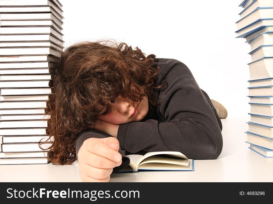 Boy sleeping and and many books on white background