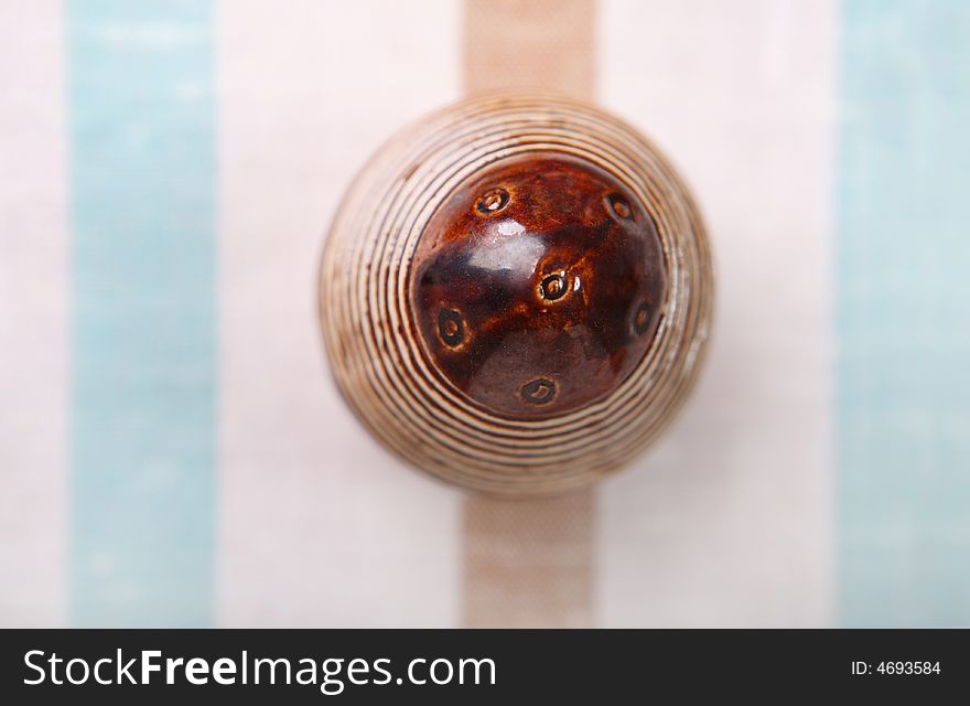 Easter decoration - striped egg on striped cloth