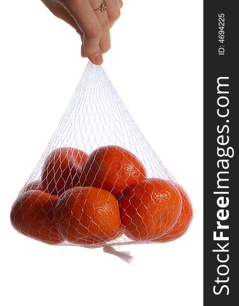 Hand holding a pack of oranges, isolated on white. Hand holding a pack of oranges, isolated on white