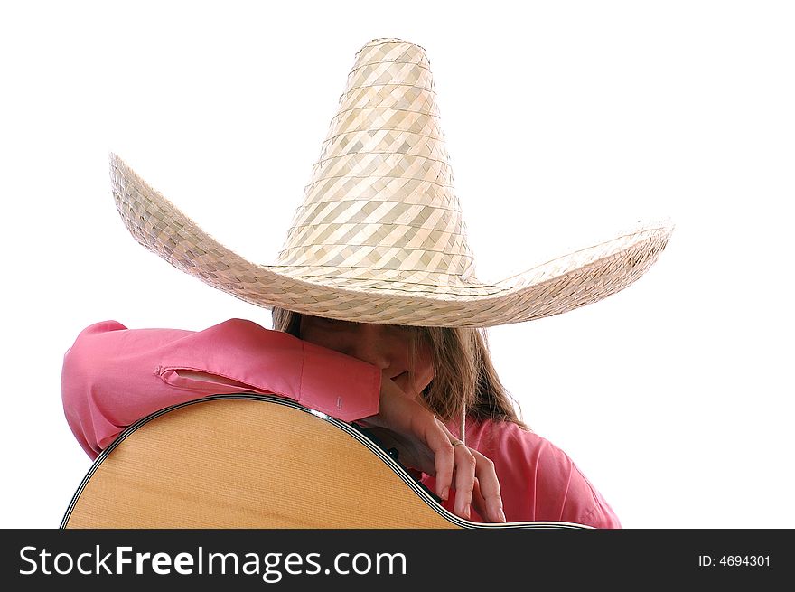 Pretty woman in large cowboy hat sitting with guitar, white background. Pretty woman in large cowboy hat sitting with guitar, white background