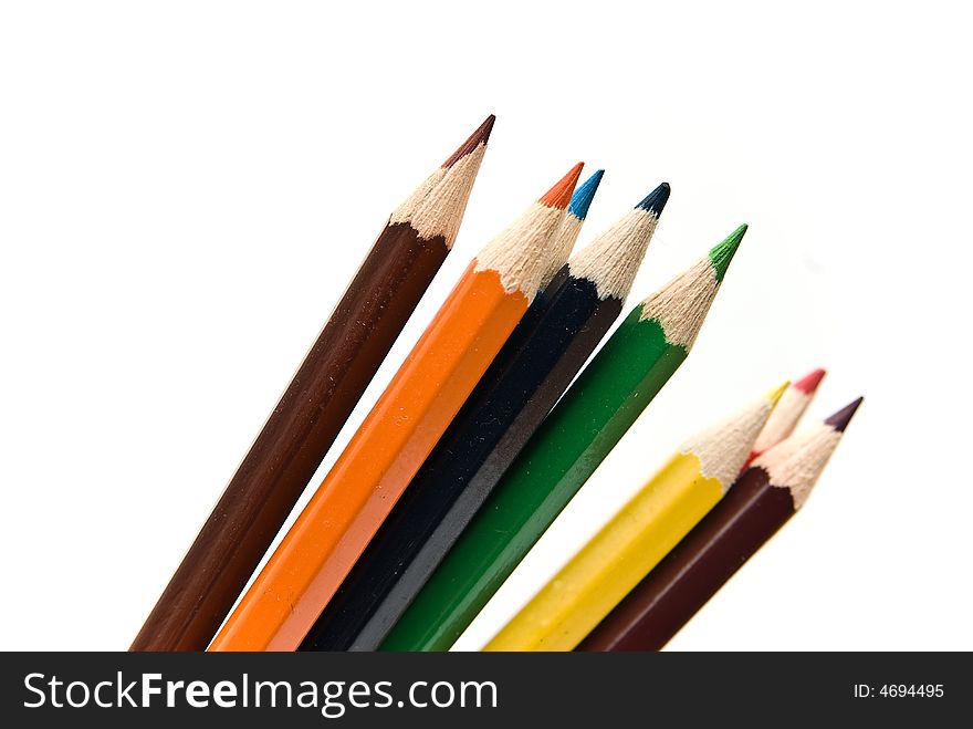 Coloured pencils on white background. Coloured pencils on white background