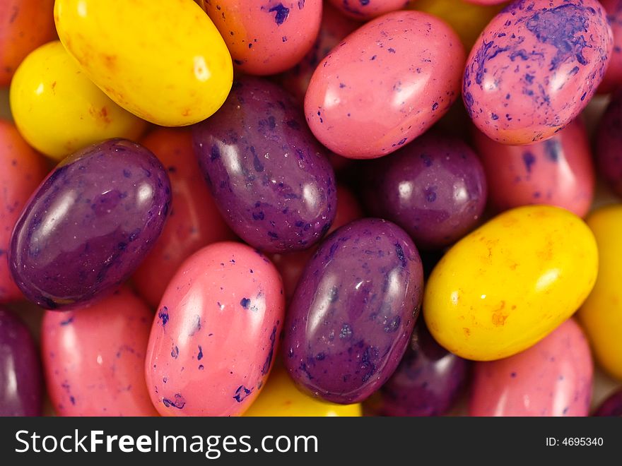 Spotted multi-color Easter candy eggs close-up