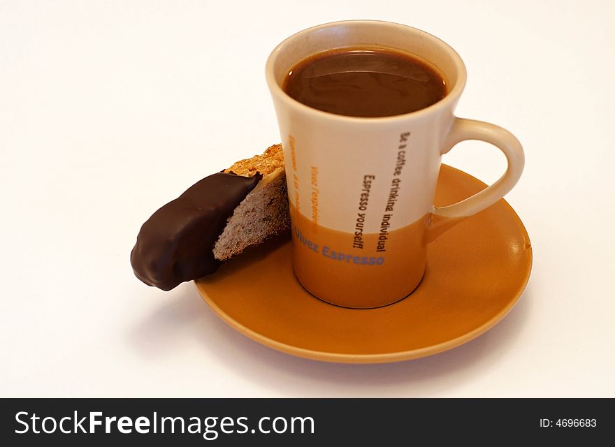 Time out for walnut biscotti dipped in a cup of espresso coffee. Time out for walnut biscotti dipped in a cup of espresso coffee.
