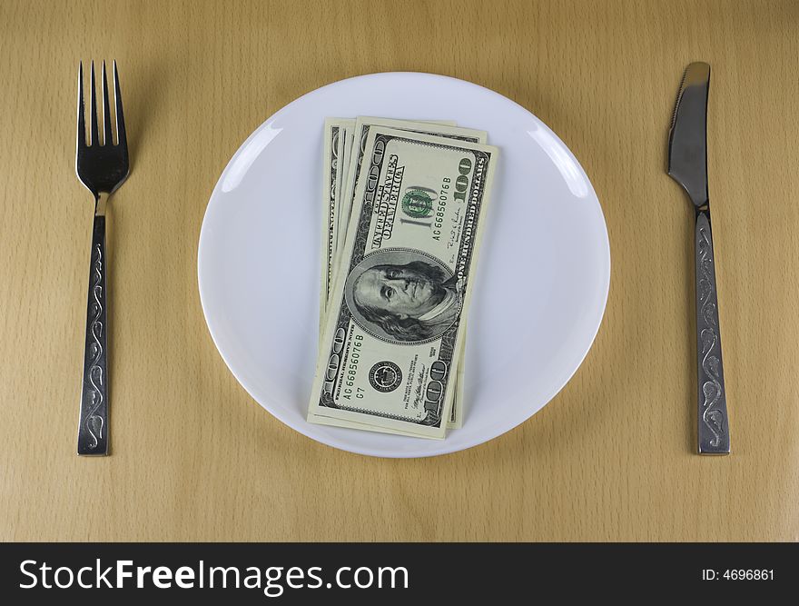 This photo illustrated concepts: money for food, money instead of food, success in making money, salary. This photo illustrated concepts: money for food, money instead of food, success in making money, salary.