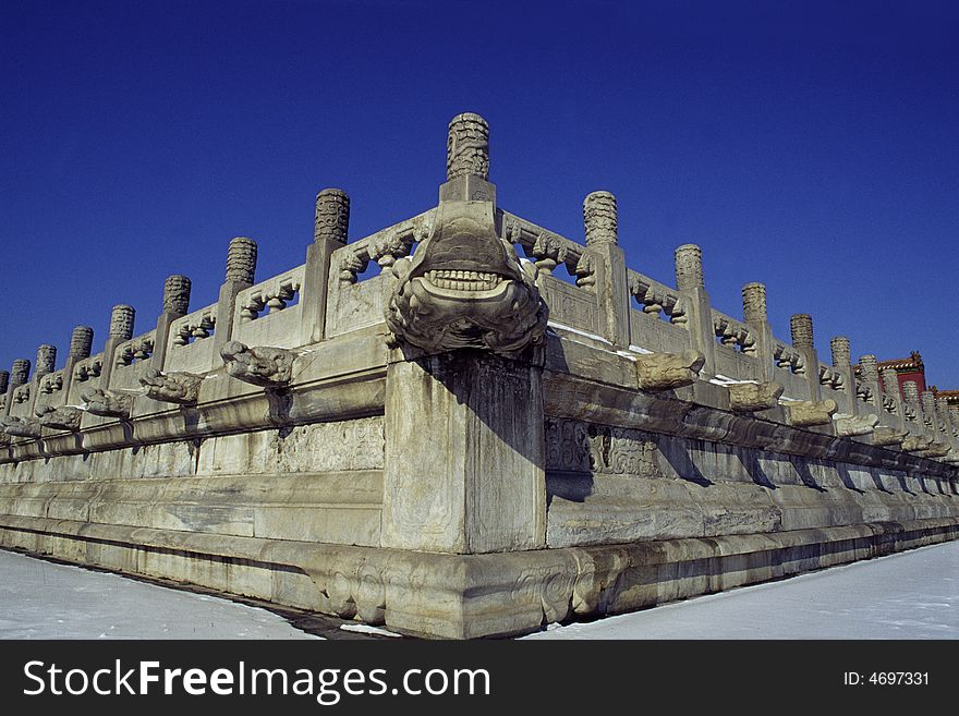 Ornately carved white marble railing inside the Forbidden City, Beijing