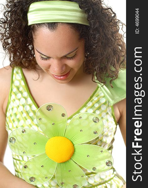 Young teen dressed in a fun polka dot spring dress with a flower. Young teen dressed in a fun polka dot spring dress with a flower