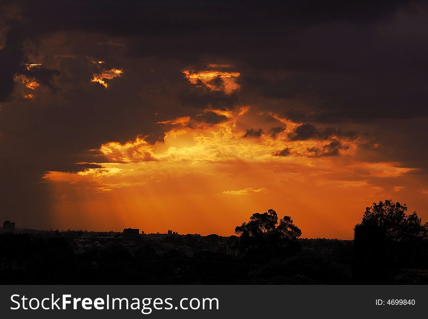 The amazing sunset, the lights and clouds are beautiful. The amazing sunset, the lights and clouds are beautiful