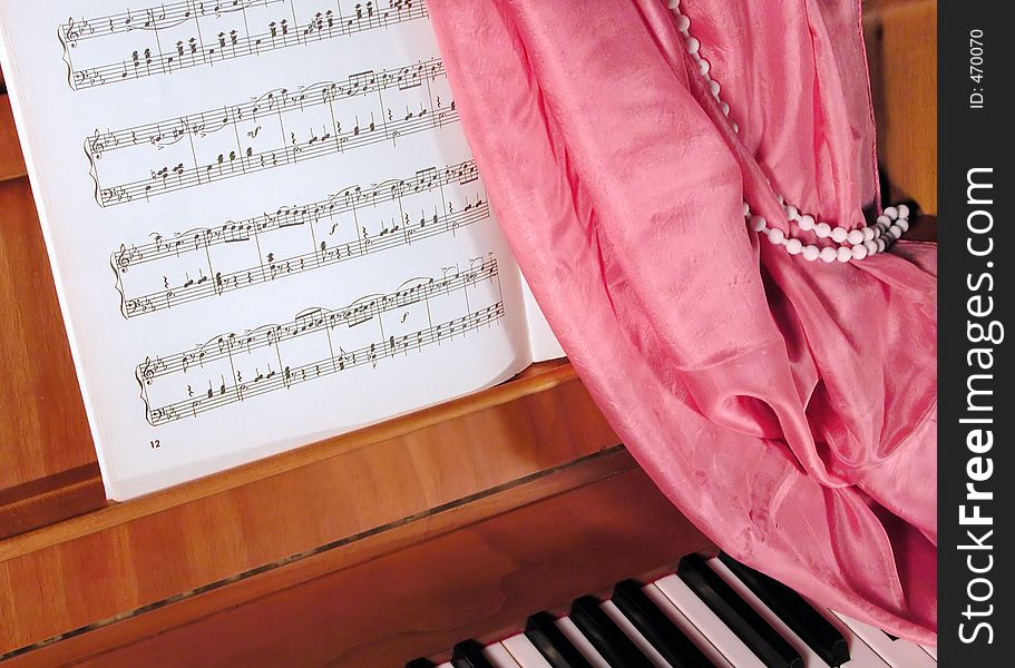 Still life with cabinet piano,score, shawl and bead. Still life with cabinet piano,score, shawl and bead