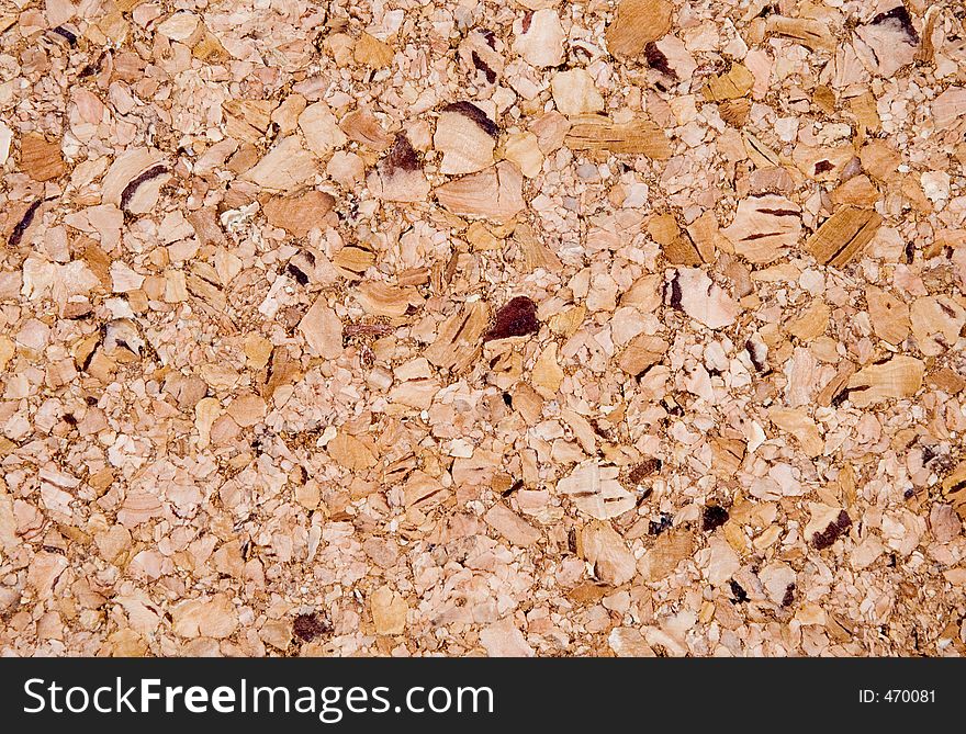 a flat piece of cork board making a textured background. a flat piece of cork board making a textured background