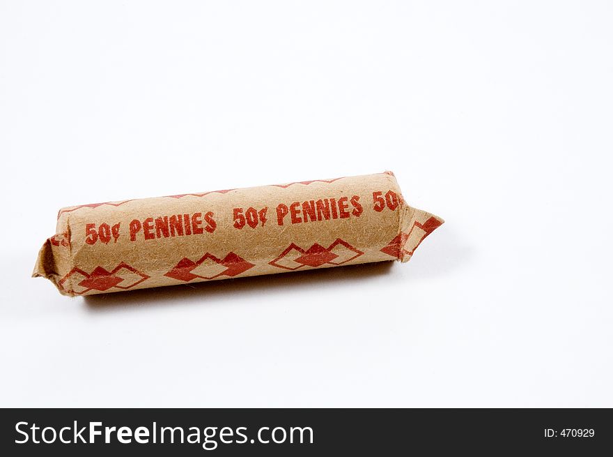 A paper roll full of pennies. A paper roll full of pennies