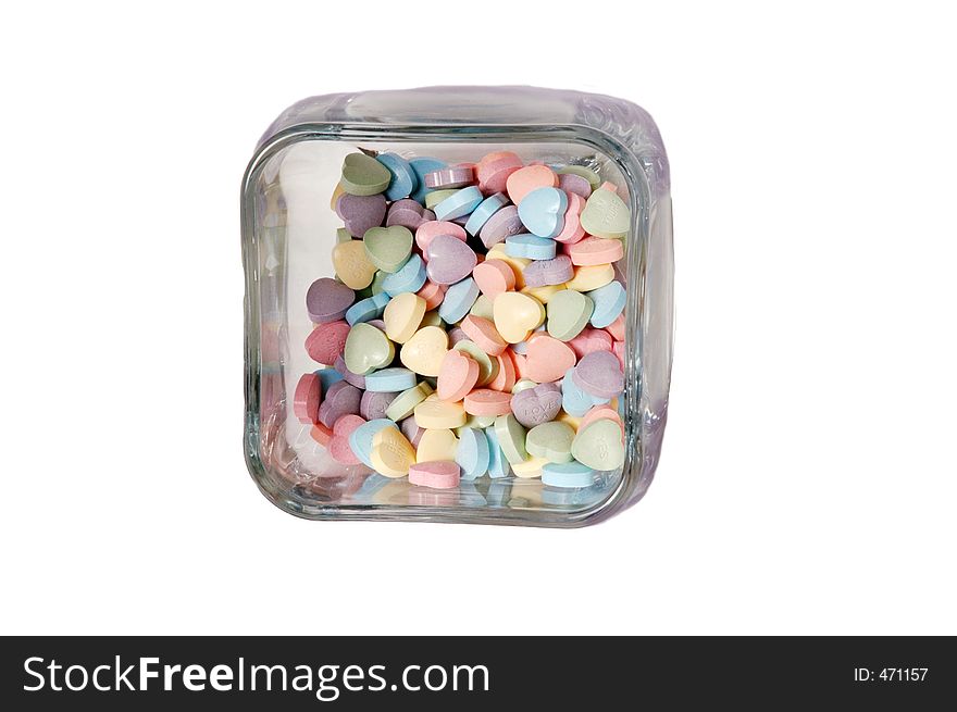 Heart shaped sweet tarts in a glass ar