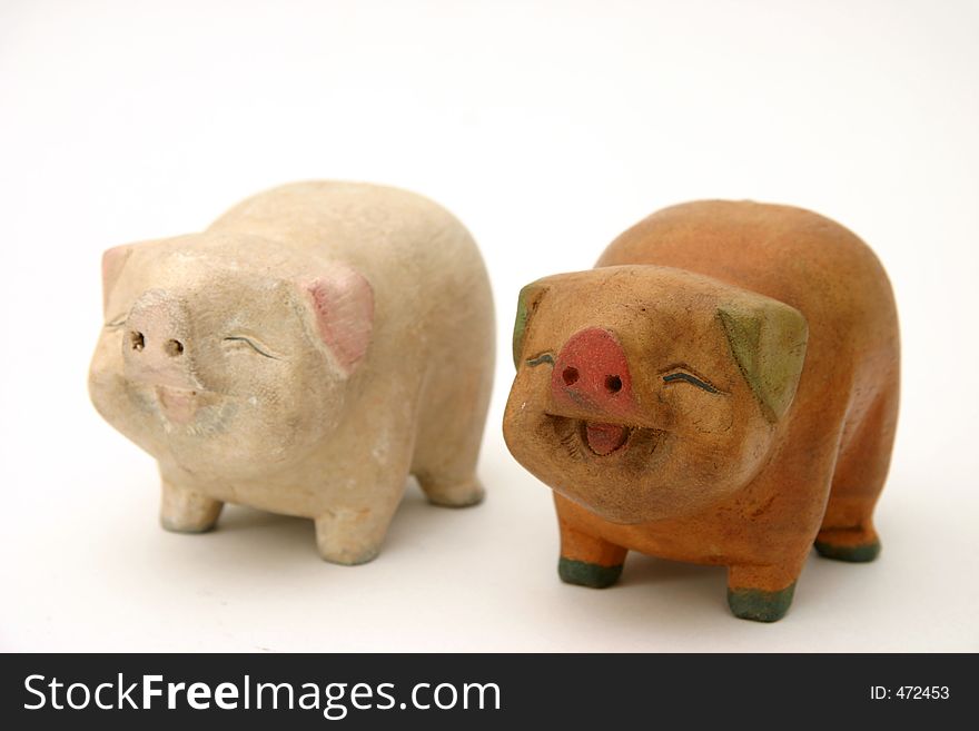 Cheerful and decorative piggy wood carvings for interiors or as gifts. Cheerful and decorative piggy wood carvings for interiors or as gifts