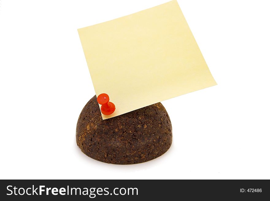 Cork sphere with pinned paper note on white background. Cork sphere with pinned paper note on white background