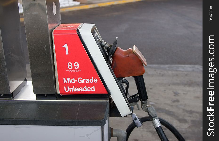 An aging fuel pump stands ready to serve gas. An aging fuel pump stands ready to serve gas.