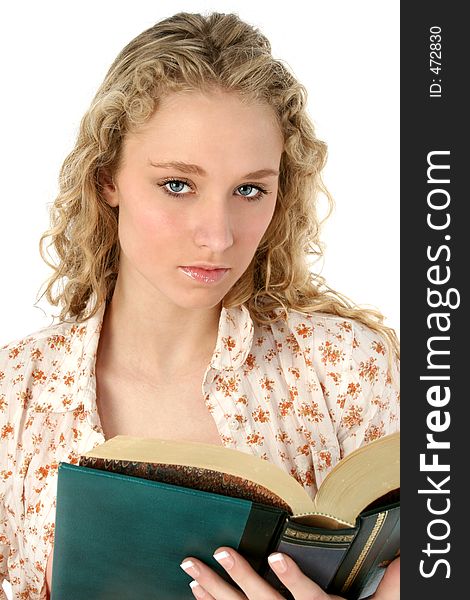 Beautiful woman reading book. Shot in studio over white. Beautiful woman reading book. Shot in studio over white.