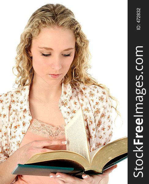 Beautiful young woman with long curly blonde hair holding open book. Shot in studio over white. Beautiful young woman with long curly blonde hair holding open book. Shot in studio over white.