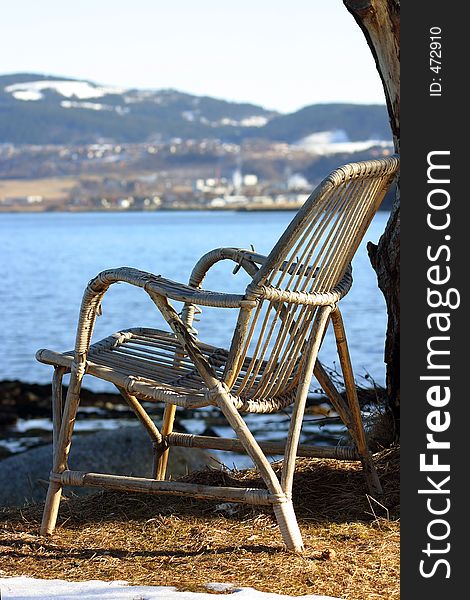 The chair from last years sunshine...A bit rusty and tired after the long norwegian winter. It's like it's waiting for the summer to come. The low sun of spring helps..