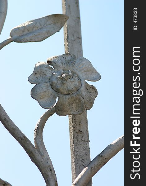 Steel Flower Against The Blue Sky