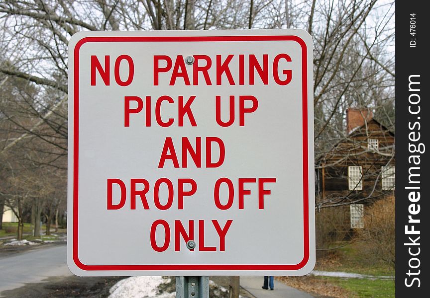 No parking sign in front of school. No parking sign in front of school.