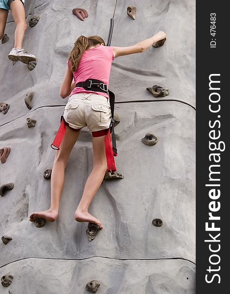 Girls rock climbing